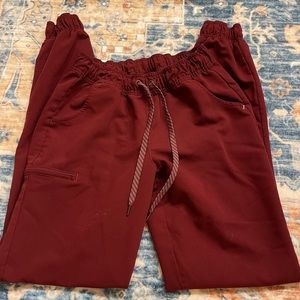 Wine red/ maroon jogger scrub bottoms size small tall. They are hardly worn.